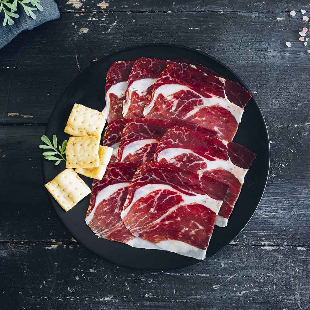 iberico pork ham slices on a plate